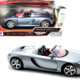 Porsche Carrera GT Convertible Silver Metallic with Red Interior 1/18 Diecast Model Car by Motormax
